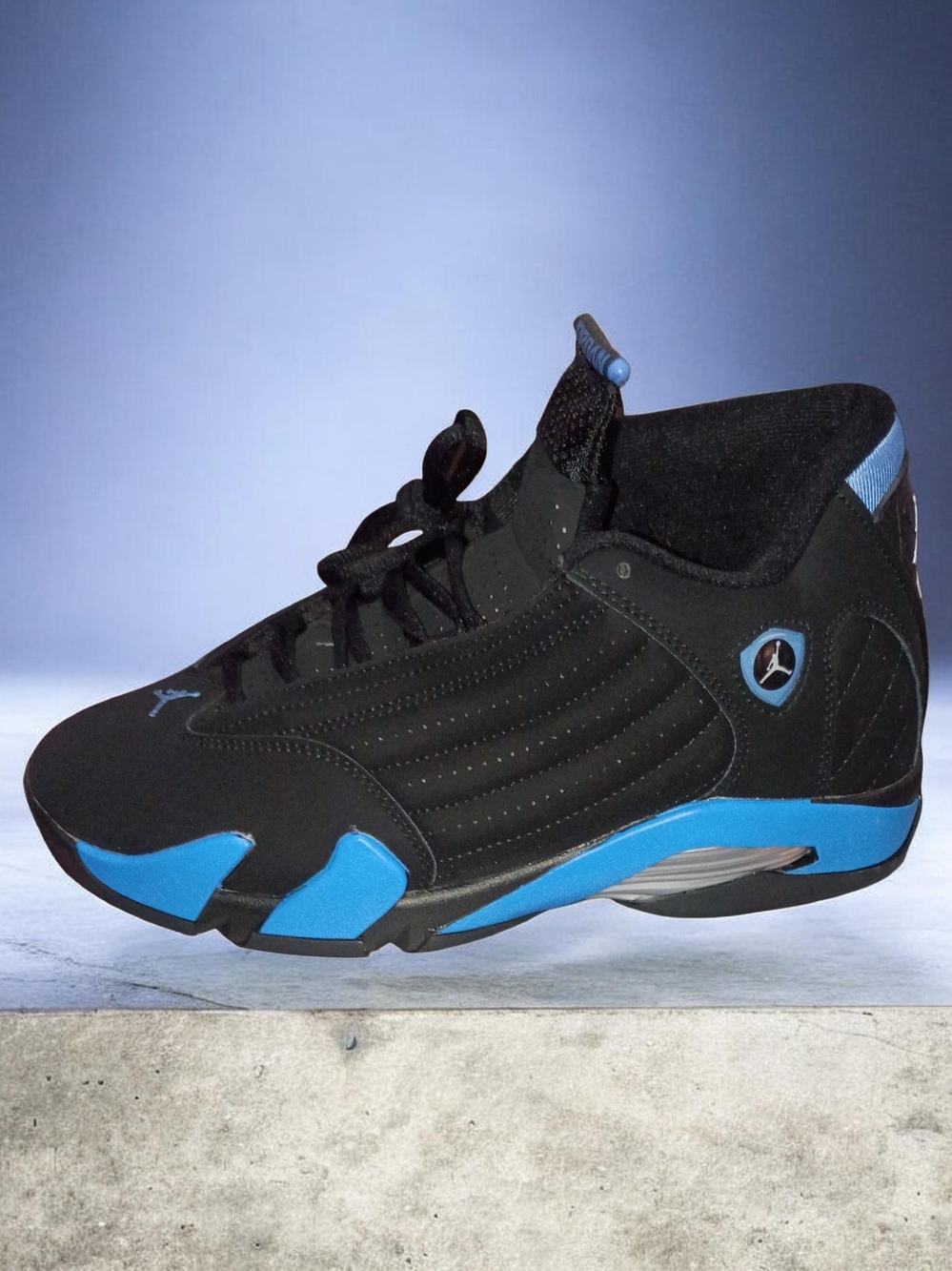 Jordan Retro High-Top Sneakers in Black and Light Blue
